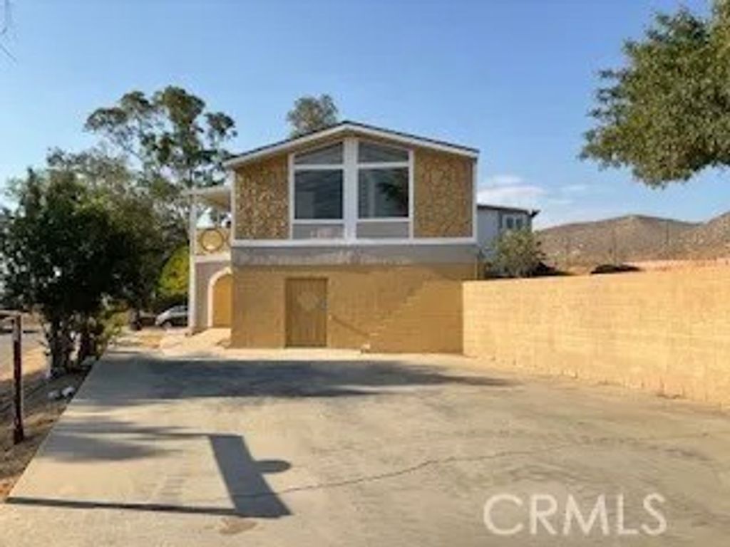 Photo of 32480 Mesa Drive, Lake Elsinore, CA 92530 (MLS # SW25141690)