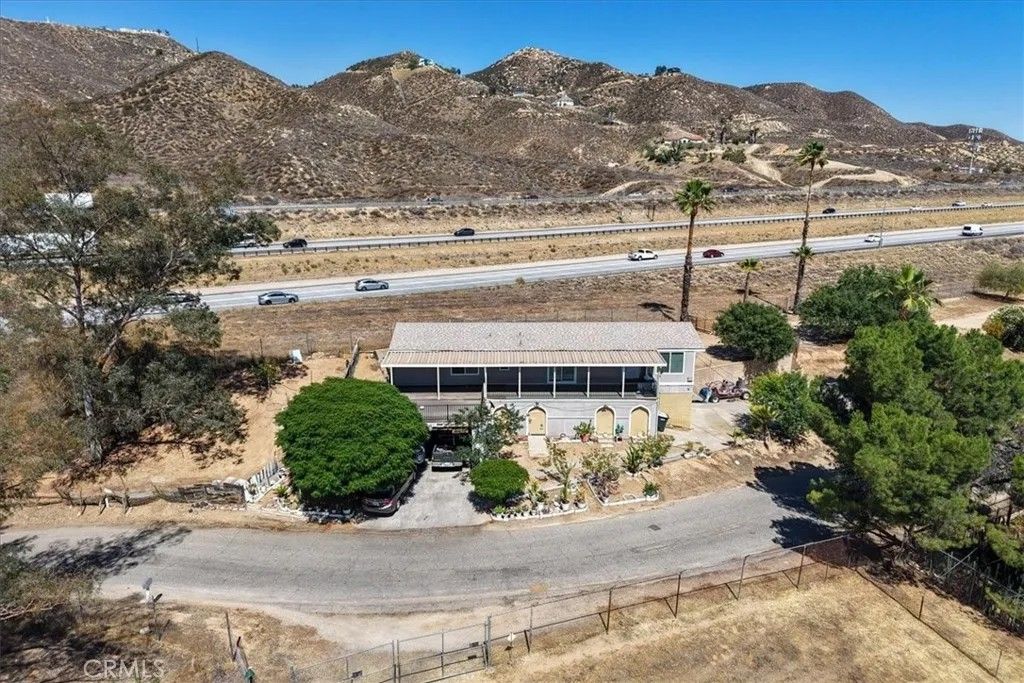 Photo of 32480 Mesa Drive, Lake Elsinore, CA 92530 (MLS # SW25141690)