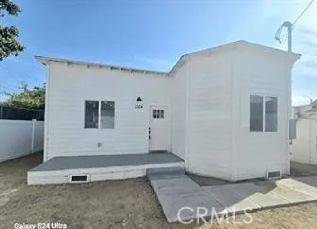 Photo of 1350 E 94th St, Los Angeles, CA 90002 (MLS # DW26089963)