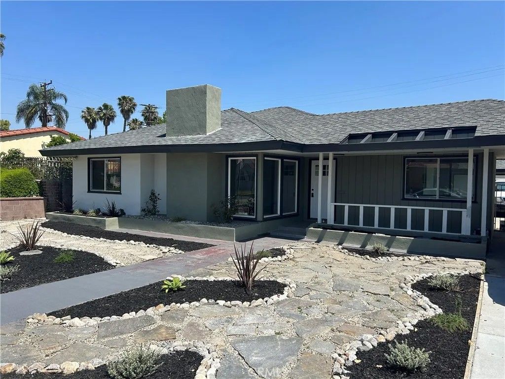 Photo of 308 S Poinsettia Ave, Compton, CA 90221 (MLS # SB26094826)