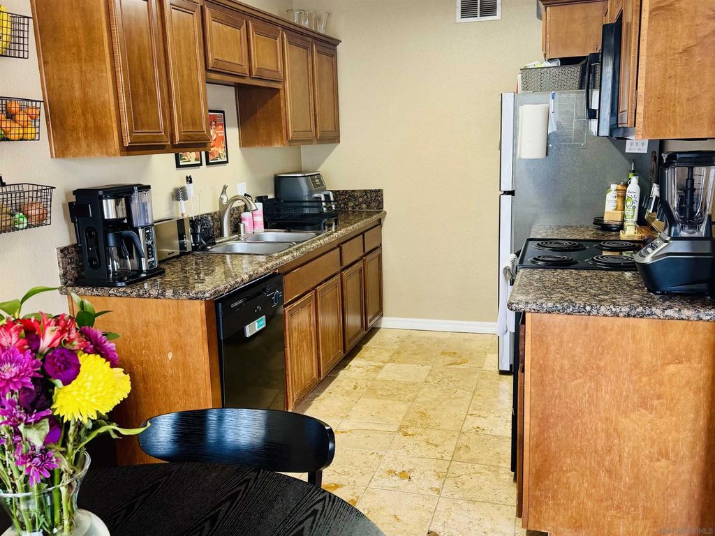 Photo of 7594 Park Ridge Blvd #13, San Diego, CA 92120 (MLS # 260001893)