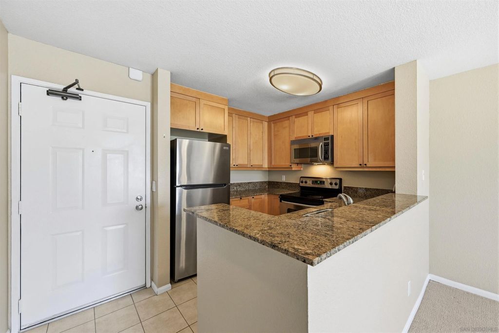 Photo of 3520 Lebon Dr #5302, San Diego, CA 92122 (MLS # 260005353)