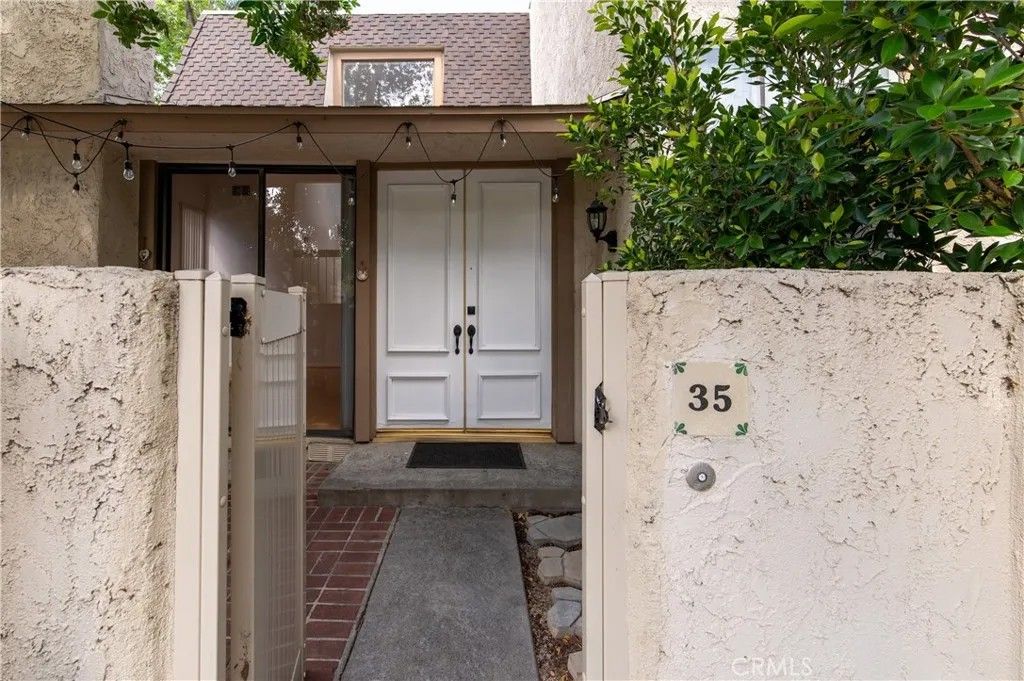 Photo of 6121 Shoup Ave #35, Woodland Hills, CA 91367 (MLS # SR26071836)