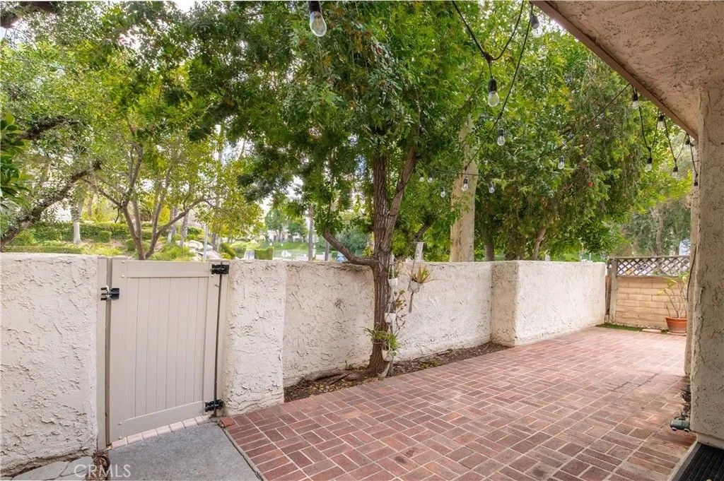 Photo of 6121 Shoup Ave #35, Woodland Hills, CA 91367 (MLS # SR26071836)