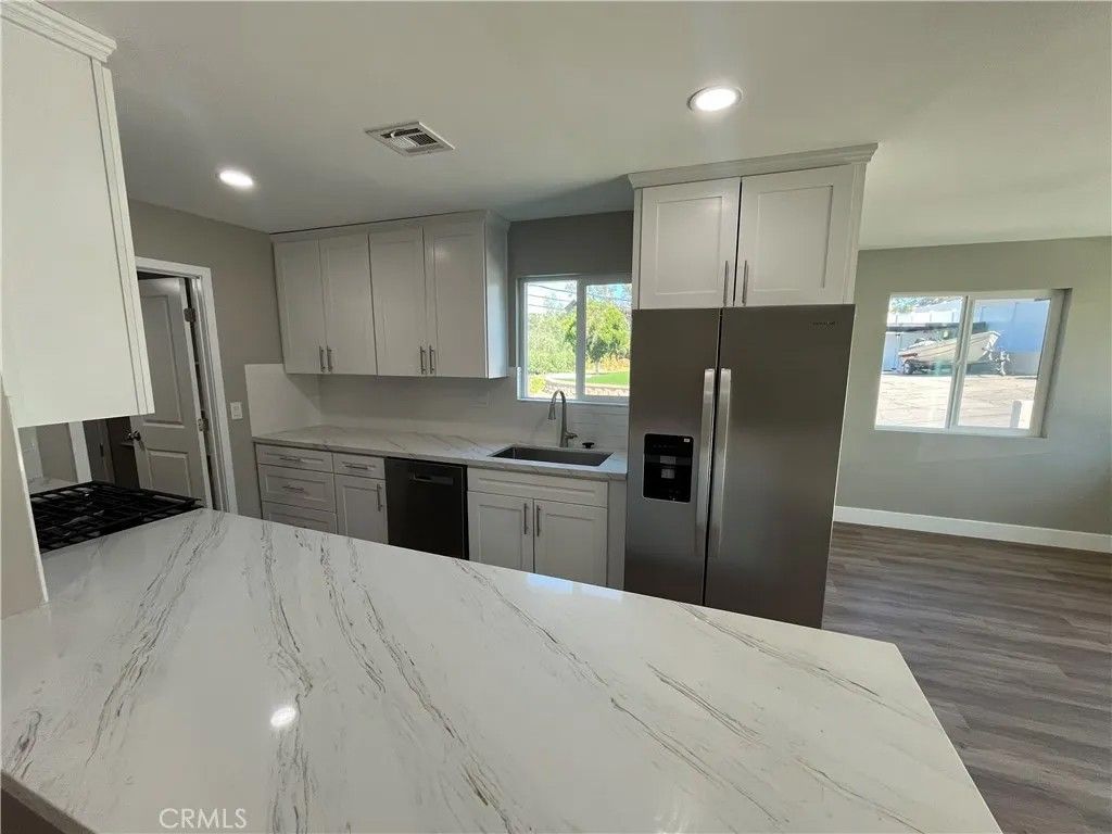 Photo of 9335 Chimney Rock Ln, El Cajon, CA 92021 (MLS # SW26066141)