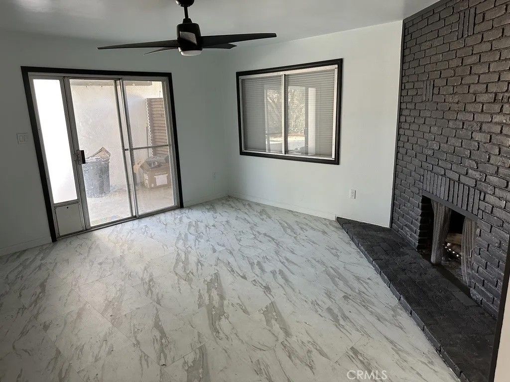 Photo of 7428 Acoma Trail #2, Yucca Valley, CA 92284 (MLS # OC25282308)