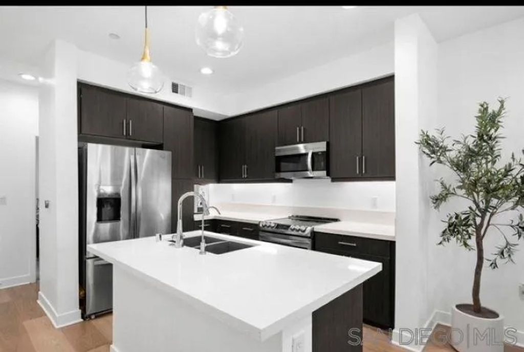 Photo of 7641 University 7641 University Ave #105, La Mesa, CA 91942 (MLS # 250040921)
