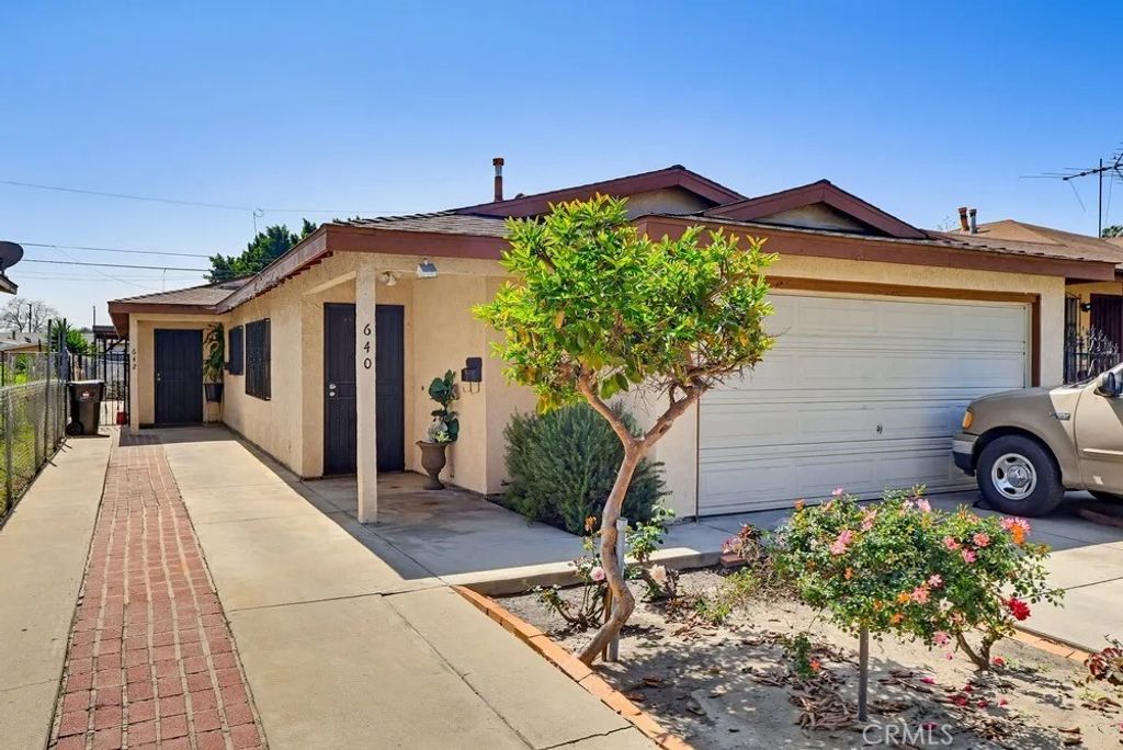 Photo of 640 E 74th St, Los Angeles, CA 90001 (MLS # DW26066734)