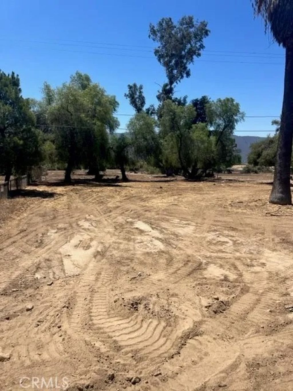 Photo of 0 Lakeshore, Lake Elsinore, CA 92530 (MLS # IV26061237)