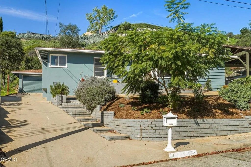 Photo of 4487 Rising Hill Road, Altadena, CA 91001 (MLS # P1-25406)