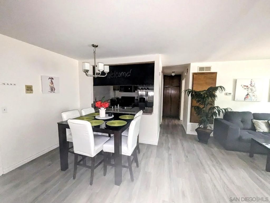 Photo of 7845 Golfcrest Dr #21, San Diego, CA 92119 (MLS # 260006007)