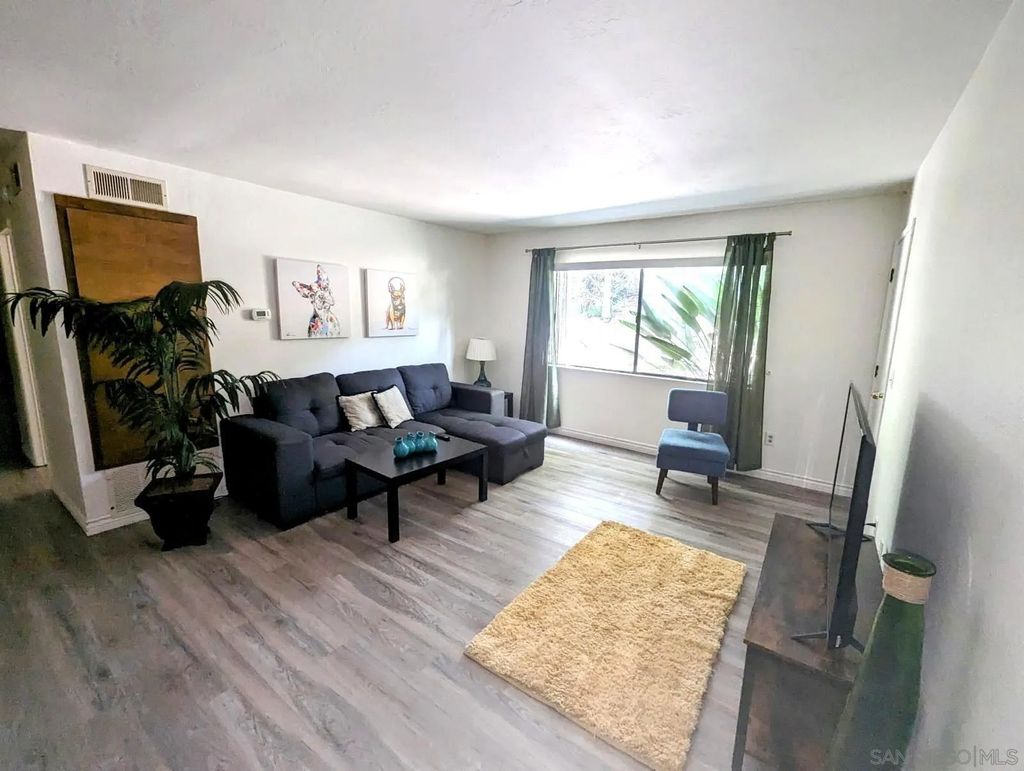 Photo of 7845 Golfcrest Dr #21, San Diego, CA 92119 (MLS # 260006007)