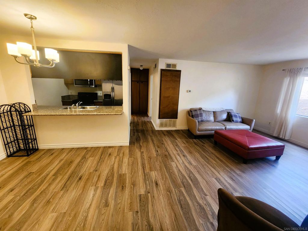 Photo of 7845 Golfcrest Dr #21, San Diego, CA 92119 (MLS # 260006007)