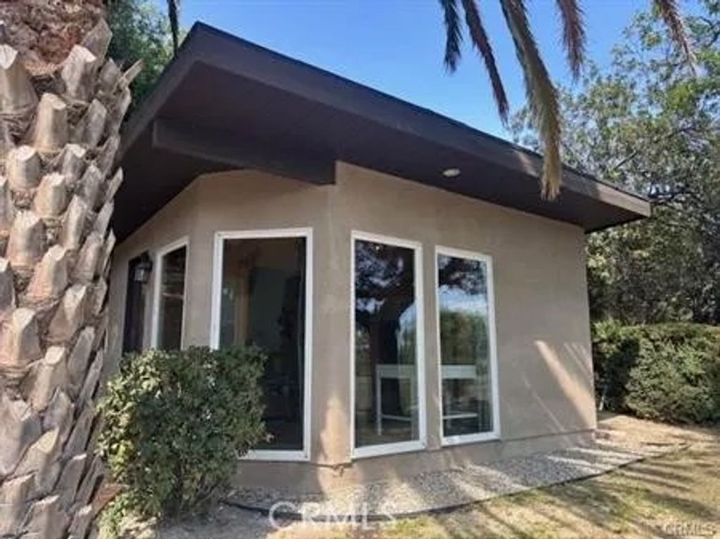 Photo of 7100 Scarborough Peak Dr, West Hills, CA 91307 (MLS # SR25280623)