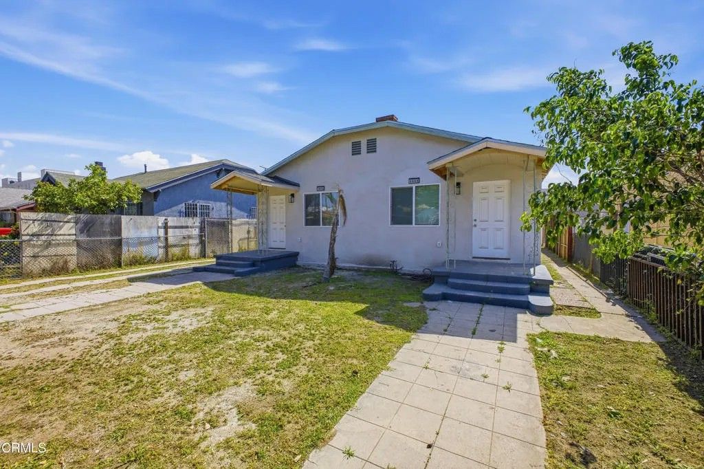 Photo of 1042 W 62nd Street, Los Angeles, CA 90044 (MLS # P1-26222)