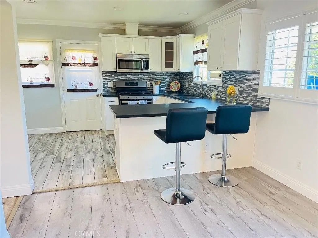 Photo of 14446 Halcourt Ave, Norwalk, CA 90650 (MLS # RS26044943)