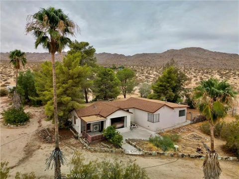 Photo of 7000 Mantonya Road, 29 Palms, CA 92277 (MLS # JT26179093)