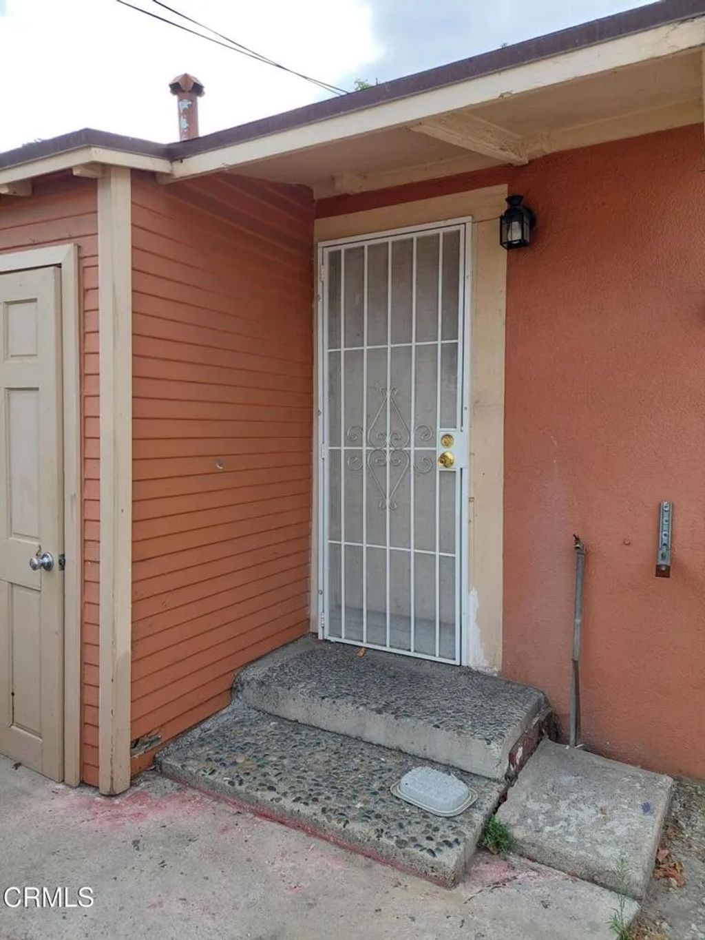 Photo of 830 N Humphreys Avenue, East Los Angeles, CA 90022 (MLS # P1-26442)