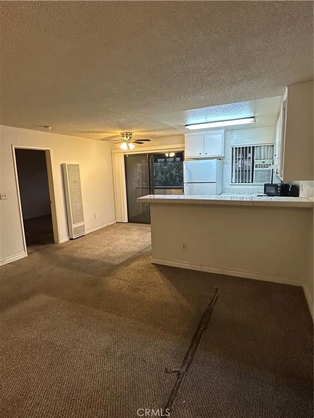 Photo of 18530 Hatteras Street #212, Tarzana, CA 91356 (MLS # SR25279277)