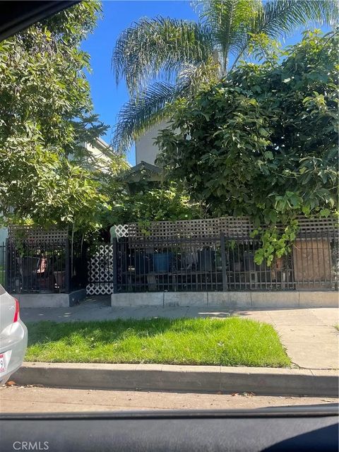 Photo of 6558 S Van Ness Ave, Los Angeles, CA 90047 (MLS # DW26012162)