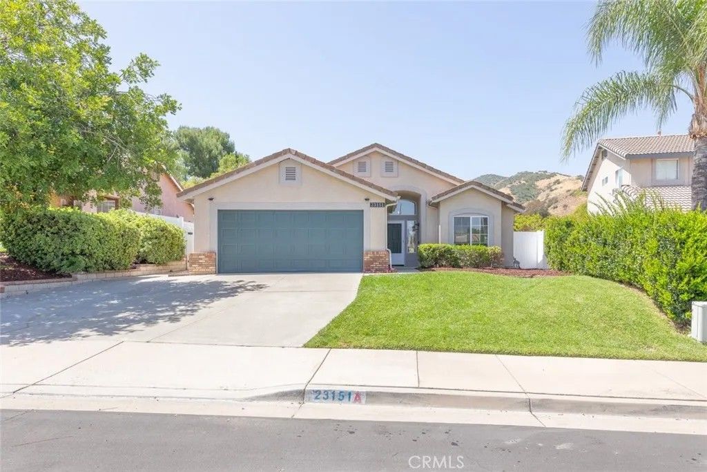 Photo of 23151 Coffee Berry Circle, Corona, CA 92883 (MLS # IG26084740)