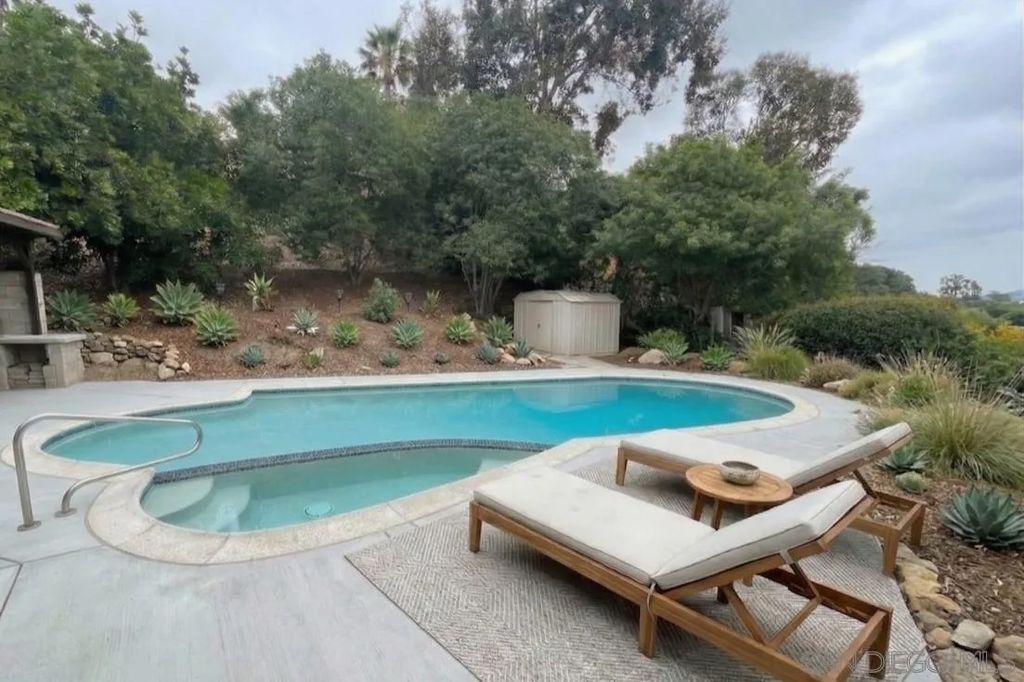 Photo of 6447 Lake Athabaska Pl, San Diego, CA 92119 (MLS # 260008316)