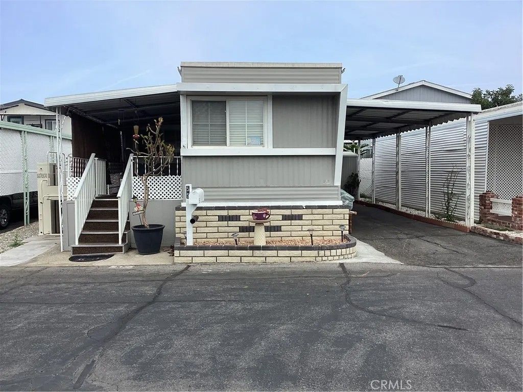 Photo of 801 W Covina Blvd #55, San Dimas, CA 91773 (MLS # SW25278994)