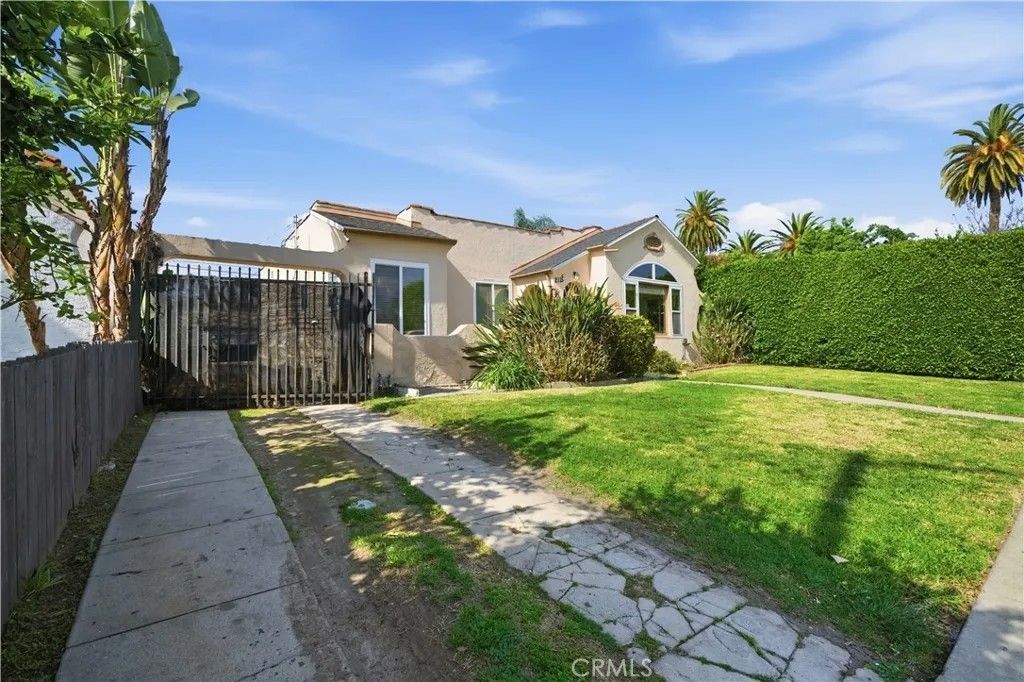Photo of 2115 S Redondo Boulevard, Los Angeles, CA 90016 (MLS # OC26028151)