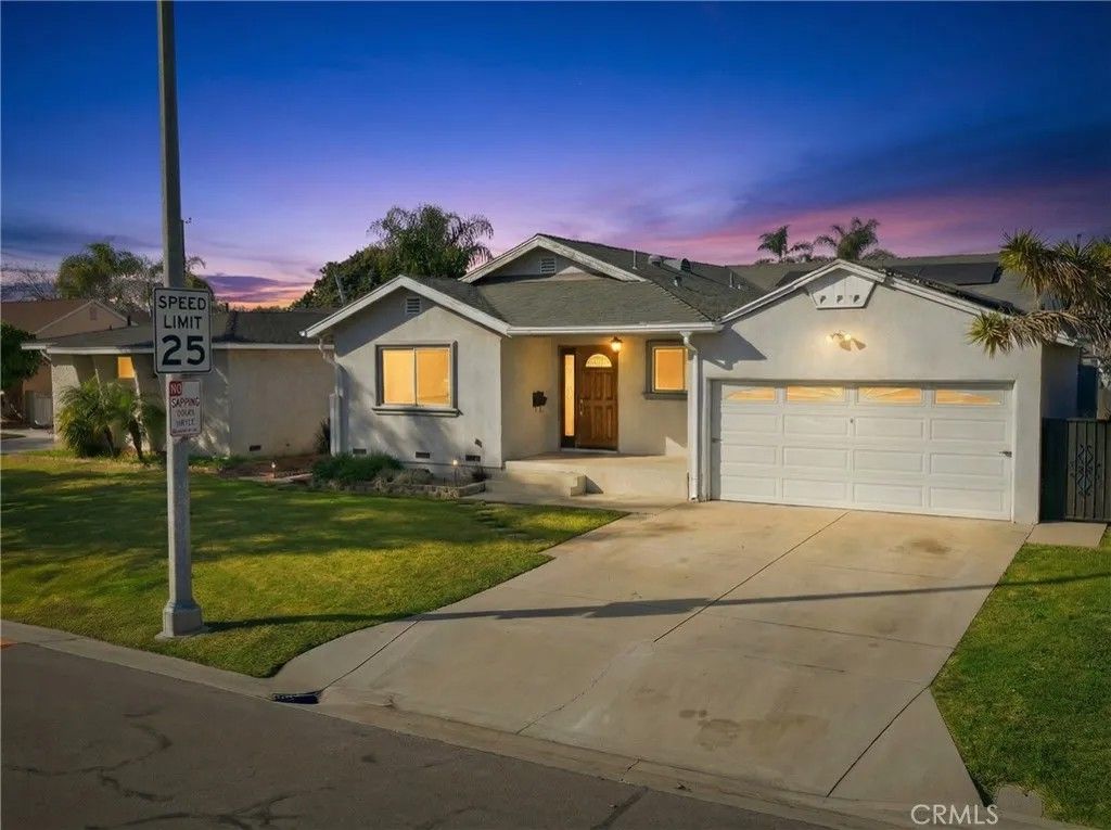 Photo of 6545 Dos Rios Rd, Downey, CA 90240 (MLS # DW26005944)