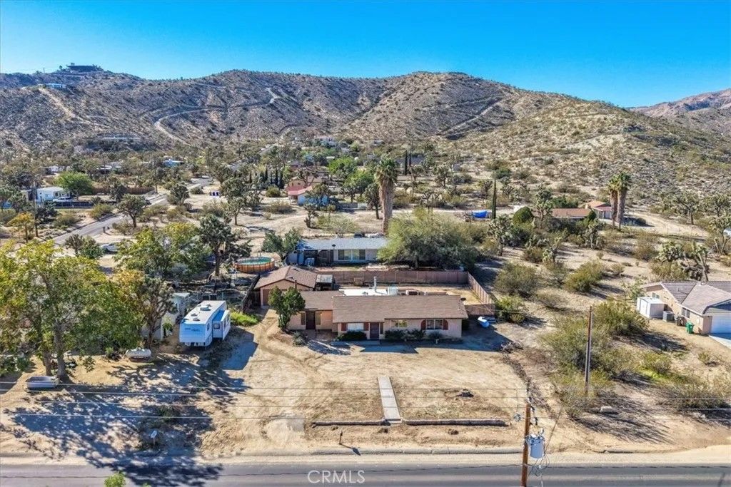 Photo of 57613 Onaga Trl, Yucca Valley, CA 92284 (MLS # JT25245647)