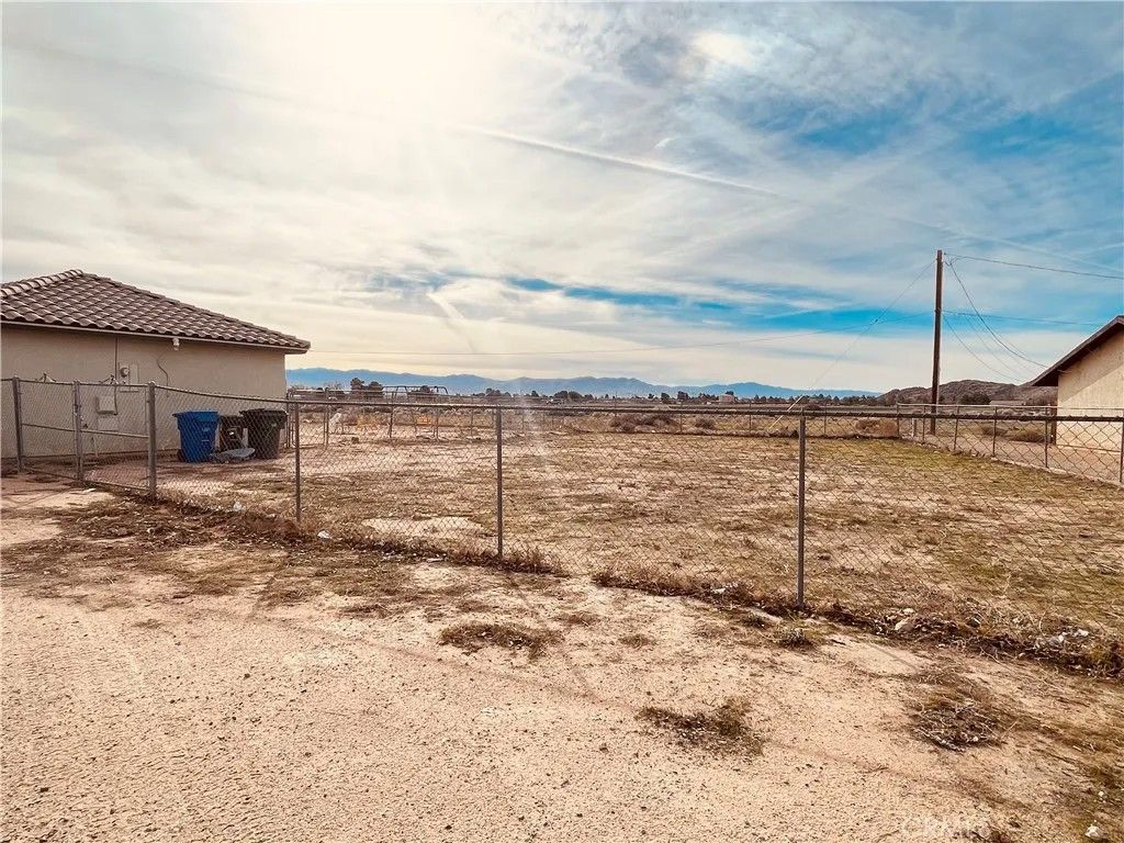 Photo of 20891 Thunderbird Rd, Apple Valley, CA 92307 (MLS # PW26002568)