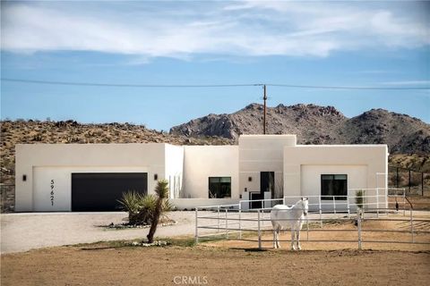Photo of 59621 Mesa Drive, Yucca Valley, CA 92284 (MLS # JT26048942)