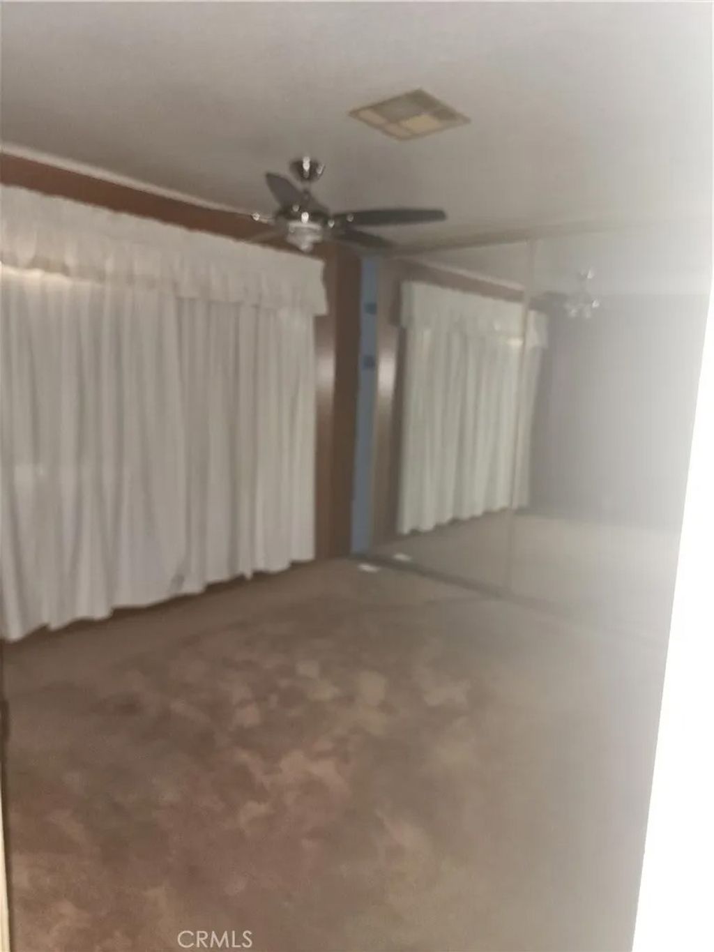 Photo of 13393 Mariposa Rd #181, Victorville, CA 92395 (MLS # HD26029009)