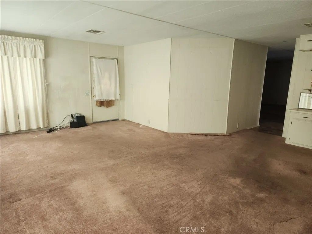 Photo of 13393 Mariposa Rd #181, Victorville, CA 92395 (MLS # HD26029009)