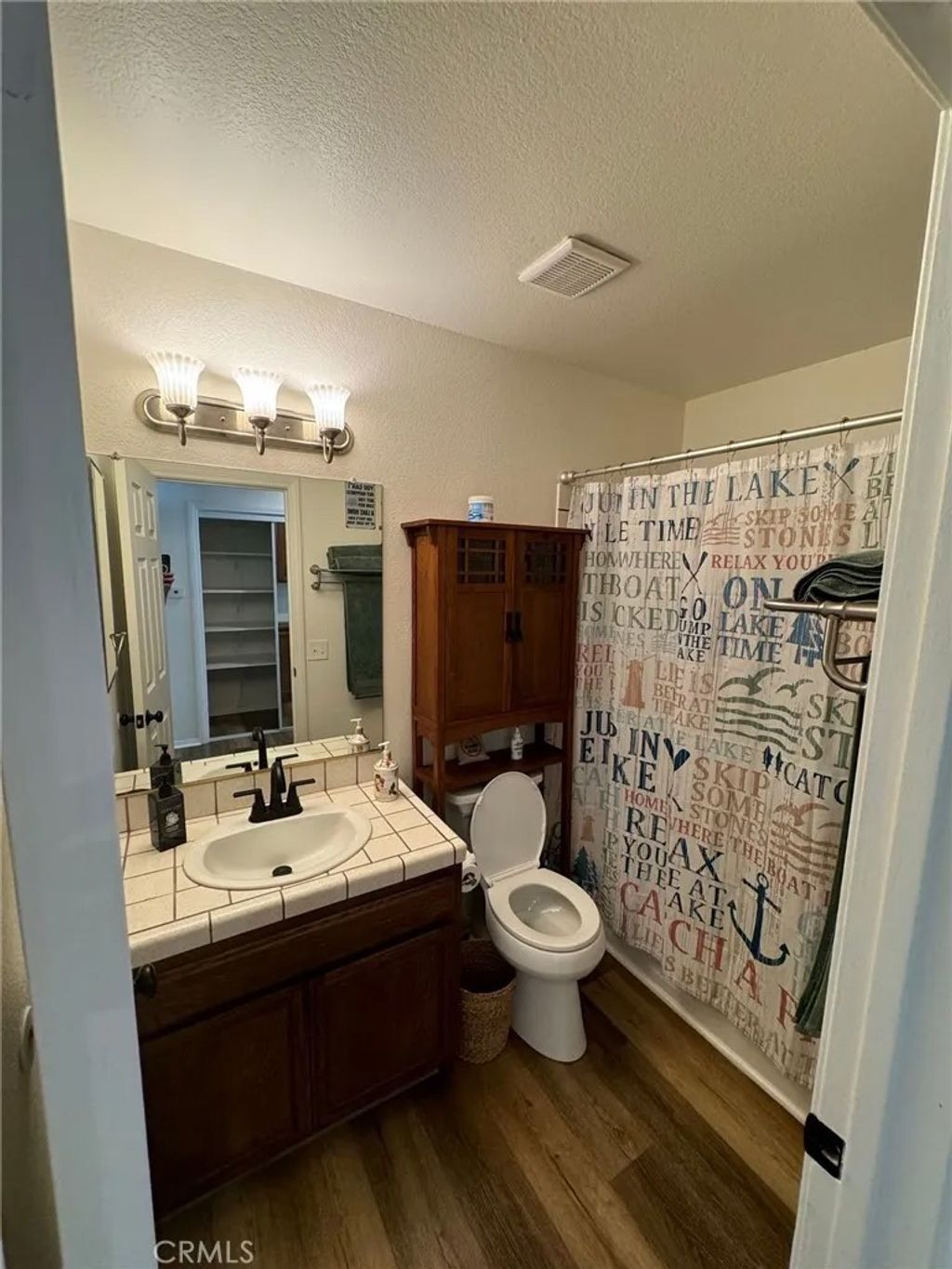 Photo of 30218 Channel Way, Canyon Lake, CA 92587 (MLS # IV25252289)