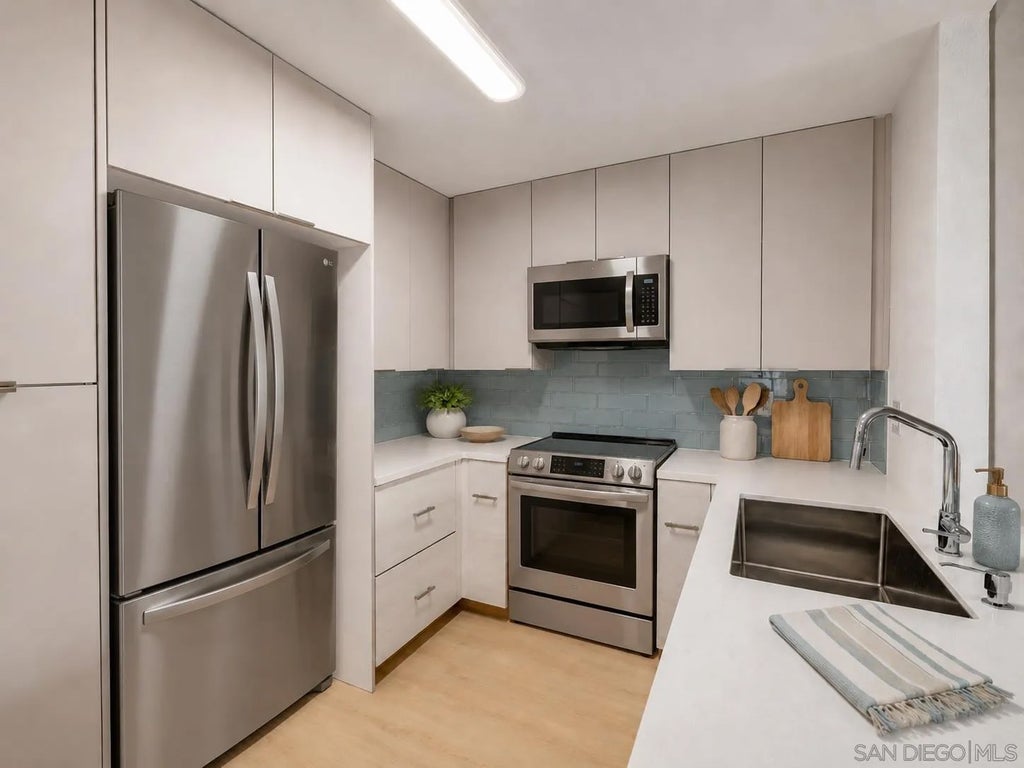 Photo of 3020 Cowley Way #305, San Diego, CA 92117 (MLS # 260015028)