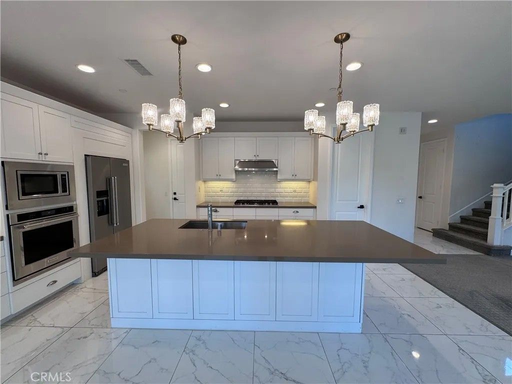 Photo of 277 Barnes Road, Tustin, CA 92782 (MLS # OC25267966)