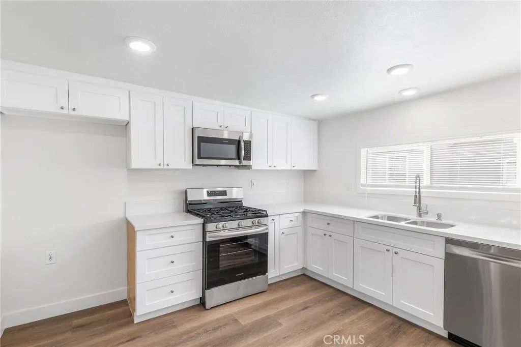 Photo of 347 N Garfield Ave, Corona, CA 92882 (MLS # IV25278078)