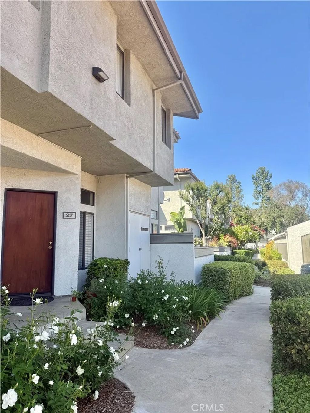 Photo of 27 Willowcrest Lane, Phillips Ranch, CA 91766 (MLS # TR26092307)