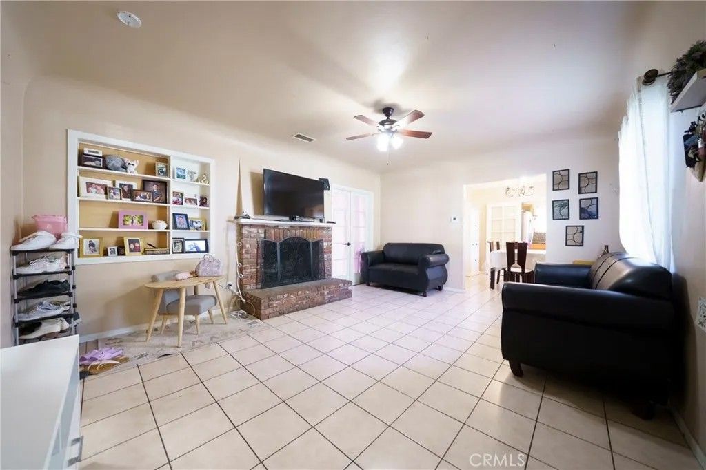 Photo of 634 E Kingsley Ave, Pomona, CA 91767 (MLS # PW25277090)