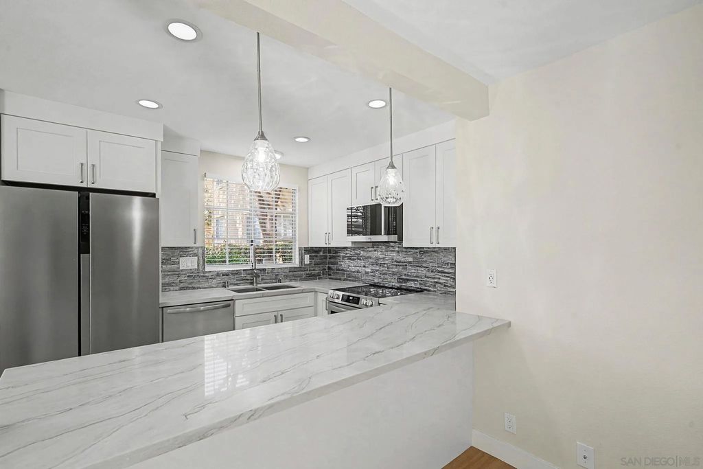 Photo of 7385 Calle Cristobal #225, San Diego, CA 92126 (MLS # 260003378)