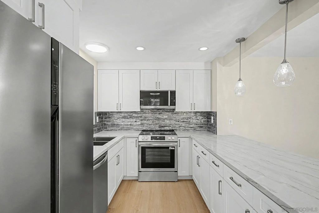 Photo of 7385 Calle Cristobal #225, San Diego, CA 92126 (MLS # 260003378)