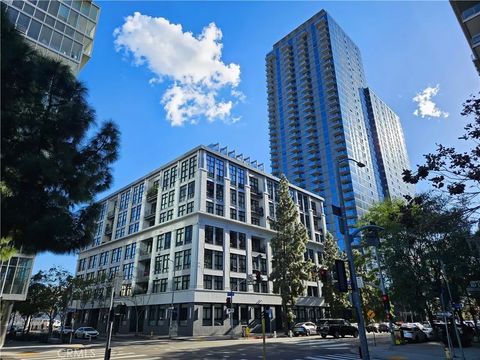 Photo of 1100 S Grand Ave #A109, Los Angeles, CA 90015 (MLS # OC26022171)