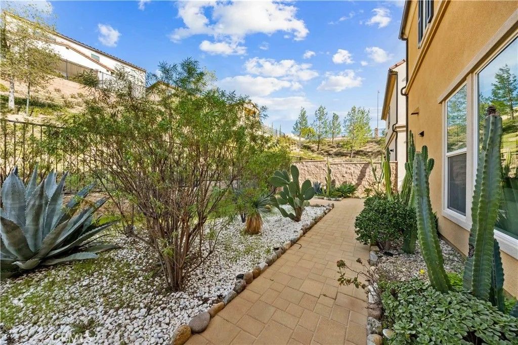 Photo of 20631 W Chestnut Cir, Porter Ranch, CA 91326 (MLS # OC26023276)