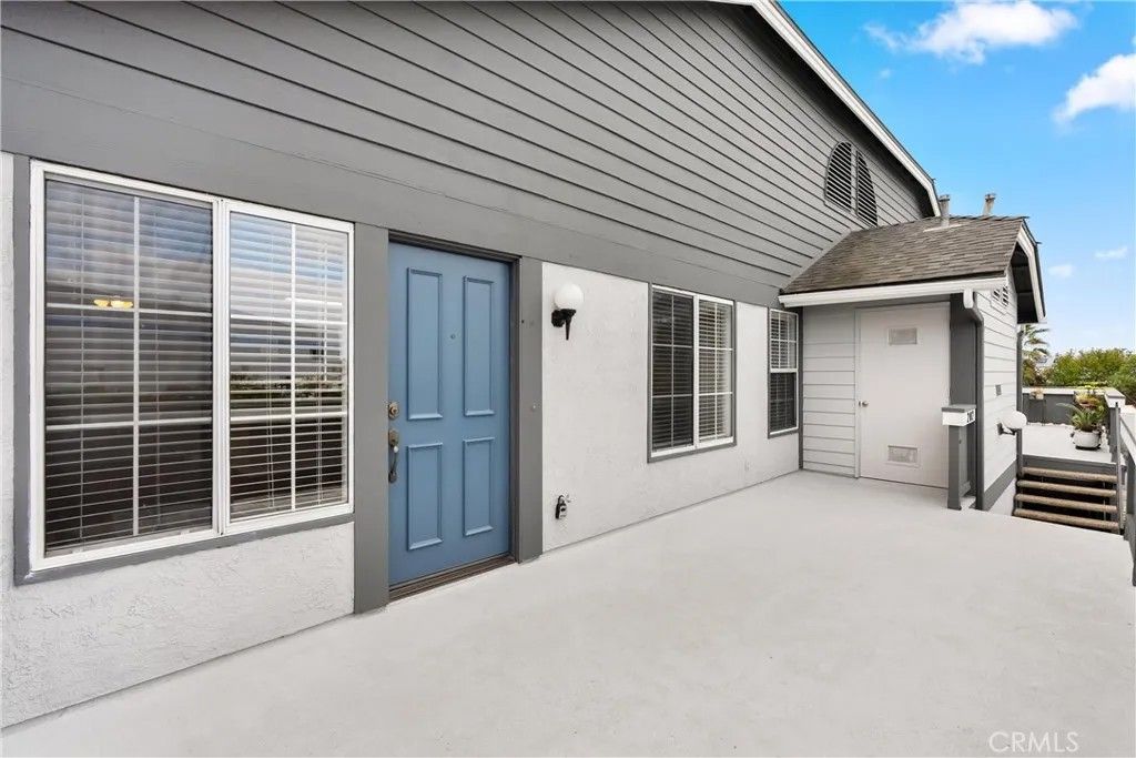 Photo of 18312 Parkview Lane #202, Huntington Beach, CA 92648 (MLS # OC25279171)