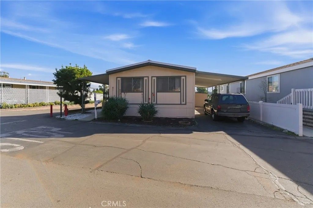 Photo of 801 W Covina Blvd #179, San Dimas, CA 91773 (MLS # IV26022968)