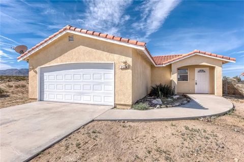 Photo of 7086 Sheridan Ave, 29 Palms, CA 92277 (MLS # JT26047746)