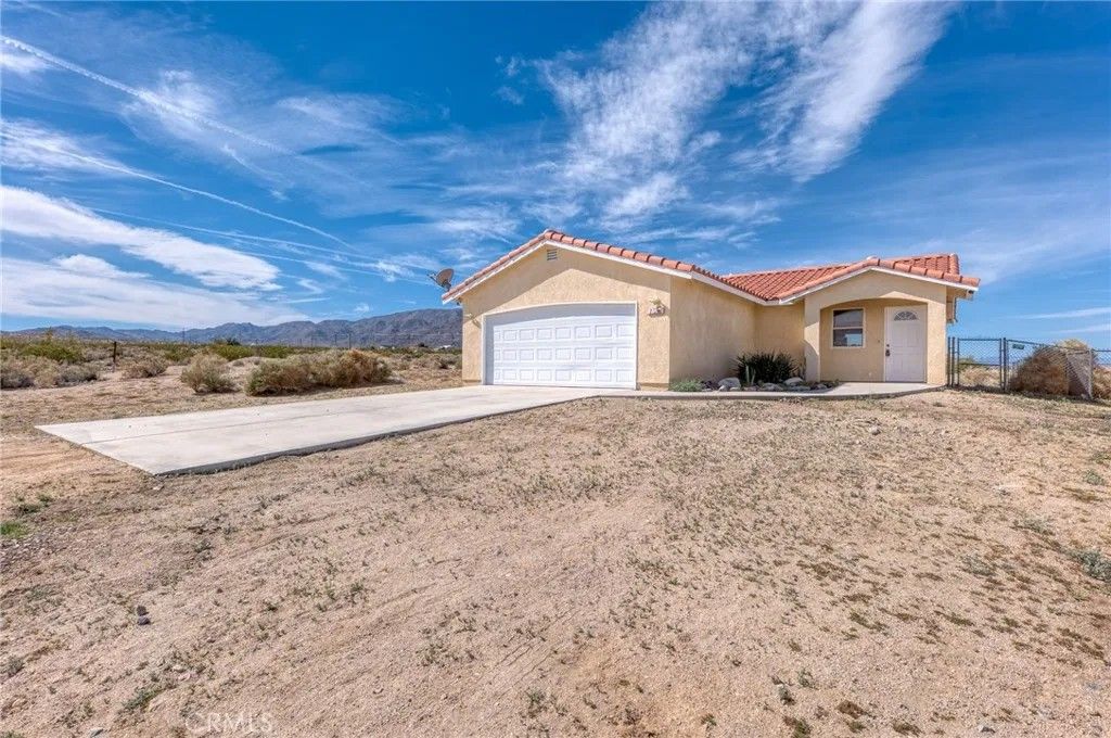 Photo of 7086 Sheridan Ave, 29 Palms, CA 92277 (MLS # JT26047746)