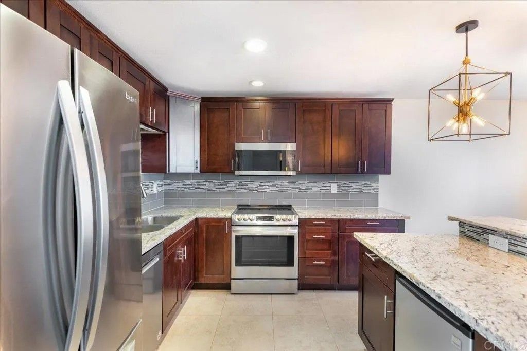 Photo of 1640 Maple Dr #32, Chula Vista, CA 91911 (MLS # NDP2600205)