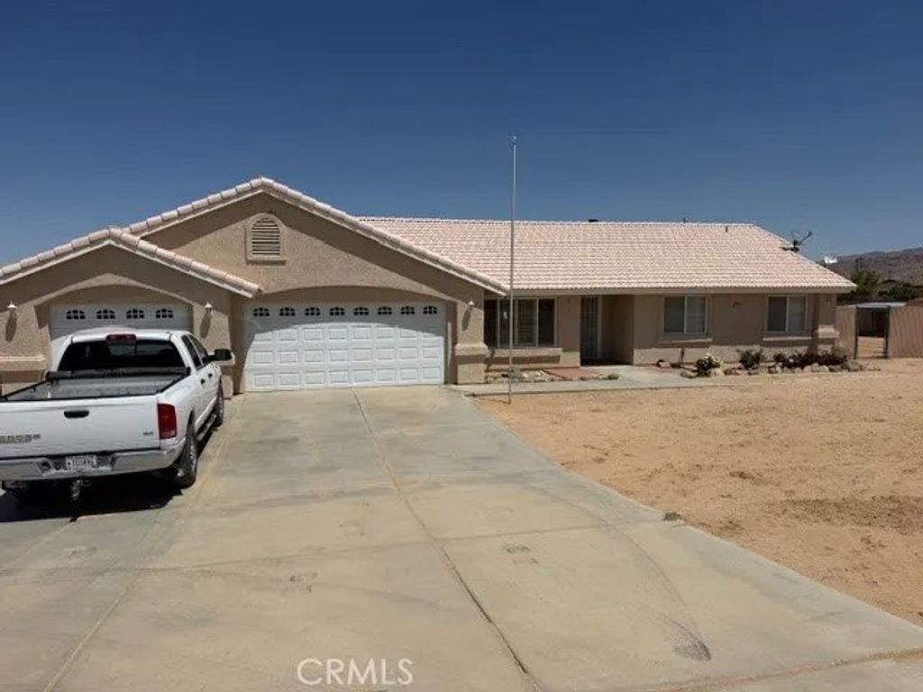 Photo of 22772 Lancelet Rd, Apple Valley, CA 92308 (MLS # HD26094014)